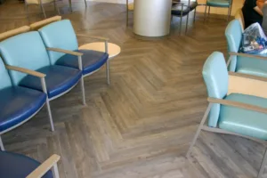 herringbone lvt install in healthcare waiting room