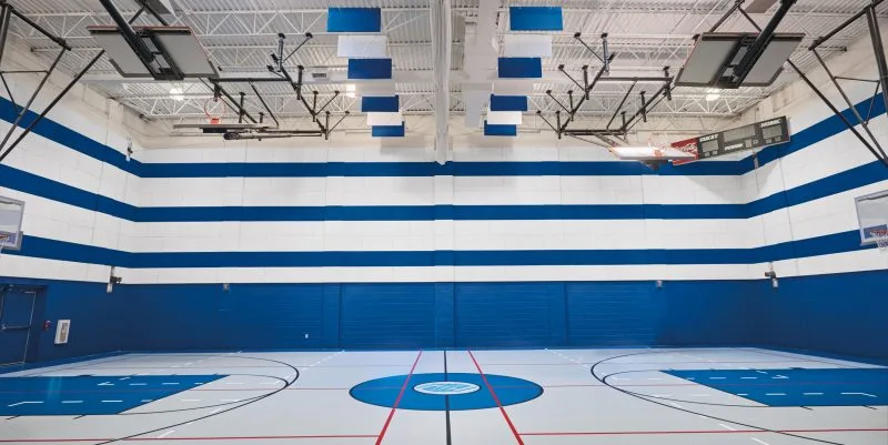 A blue and white indoor gym 